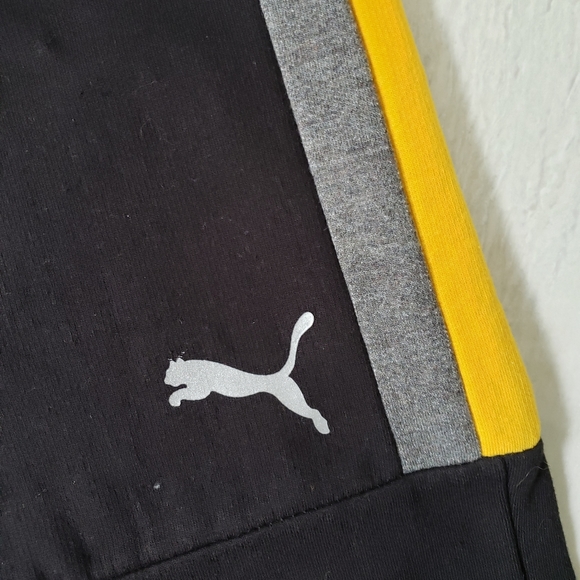 Brand new Puma sweatpants for kid's or women. Black with yellow and gray stripes - Picture 4 of 5